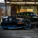 Raxiom 05-09 Ford Mustang GT V6 Axial Series CCFL Halo Projector Headlight- Blk Housing (Smkd Lens)