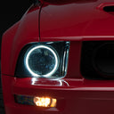 Raxiom 05-09 Ford Mustang GT V6 Axial Series CCFL Halo Projector Headlight- Blk Housing (Smkd Lens)