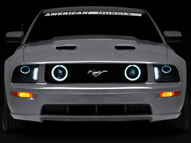 Raxiom 05-09 Ford Mustang w/ Halogen LED Halo Prjctr Headlights-Blk Hsng(Smoked Lens Exclude GT500)