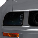 Raxiom 05-09 Ford Mustang w/ Halogen LED Halo Prjctr Headlights-Blk Hsng(Smoked Lens Exclude GT500)